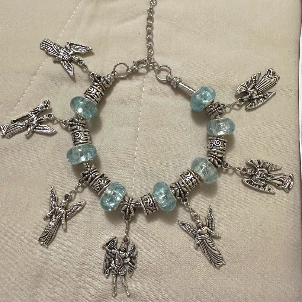 Handmade – NWOT – 925 SS plated archangel charm bracelet. Light blue beads